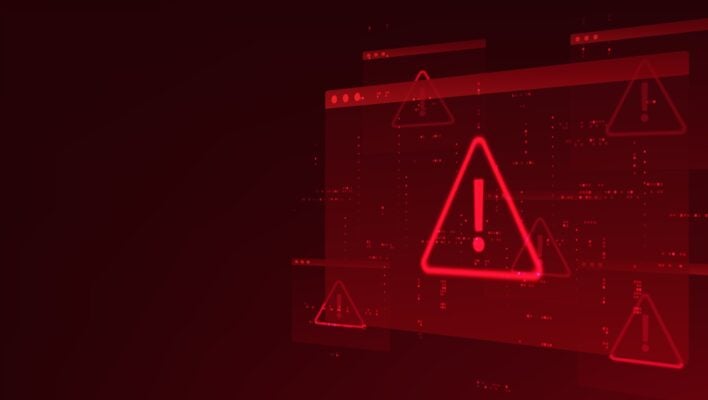 A computer screen showing a red warning symbol (a triangle with an exclamation point in the middle).
