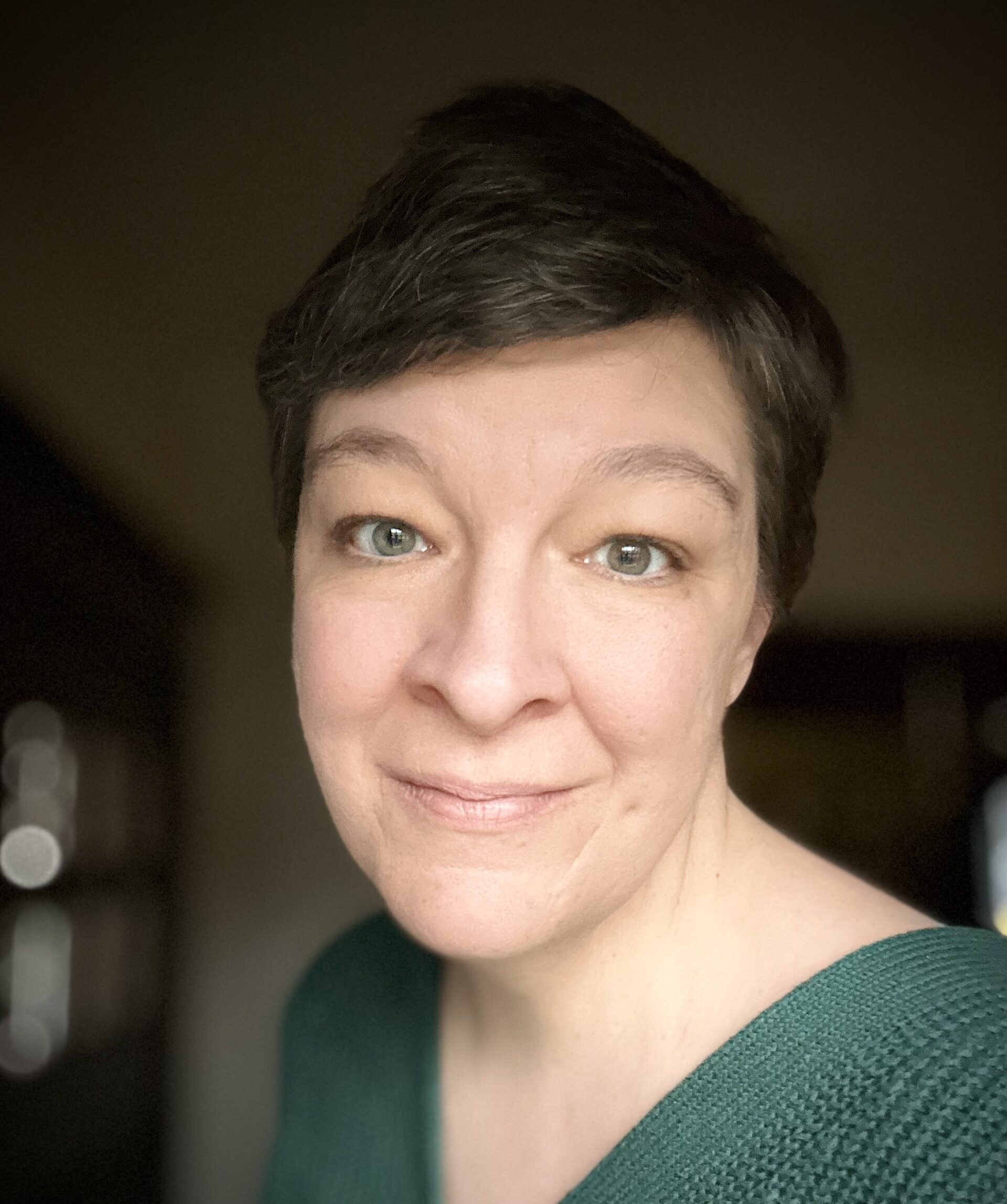 Betsy Reyes smiling.