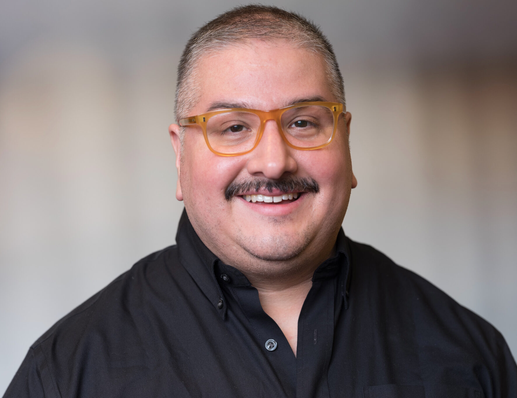 Carlos Salazar smiling.