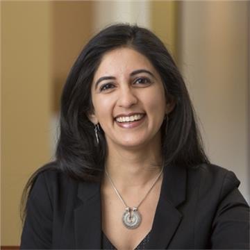 Harveen Sethi smiling.