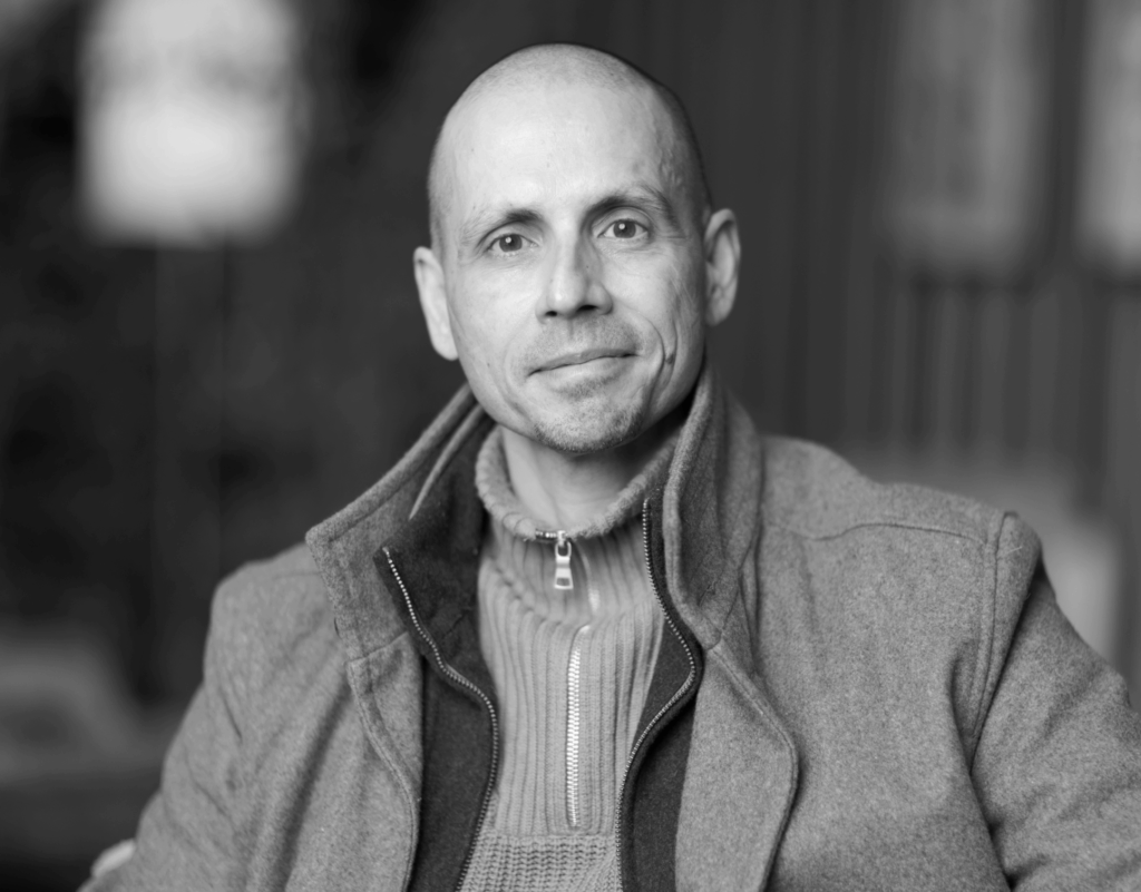 Marc K. Hébert smiling.
