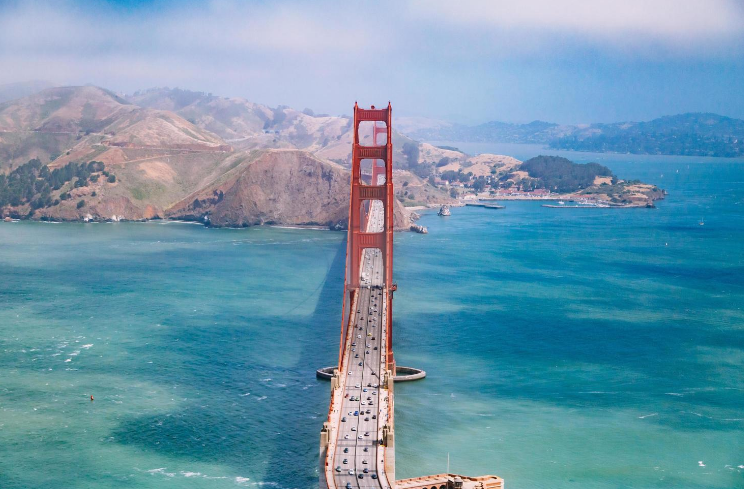 A shot of the Golden Gate Bridge over the bay on a clear day.
