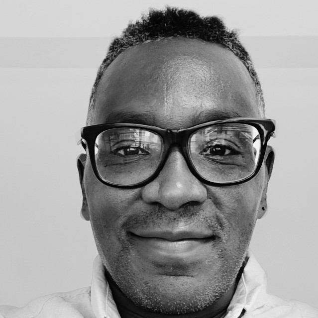 Tommy Thomas smiling.