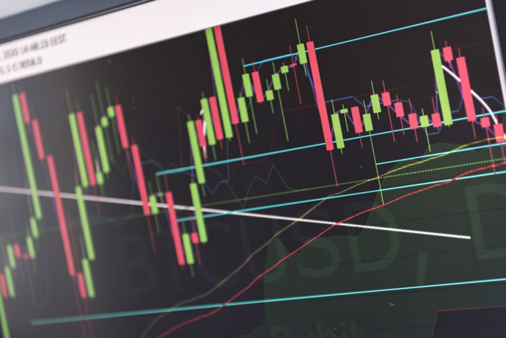 Close-up of vibrant stock market graphs displaying trading trends on a monitor.